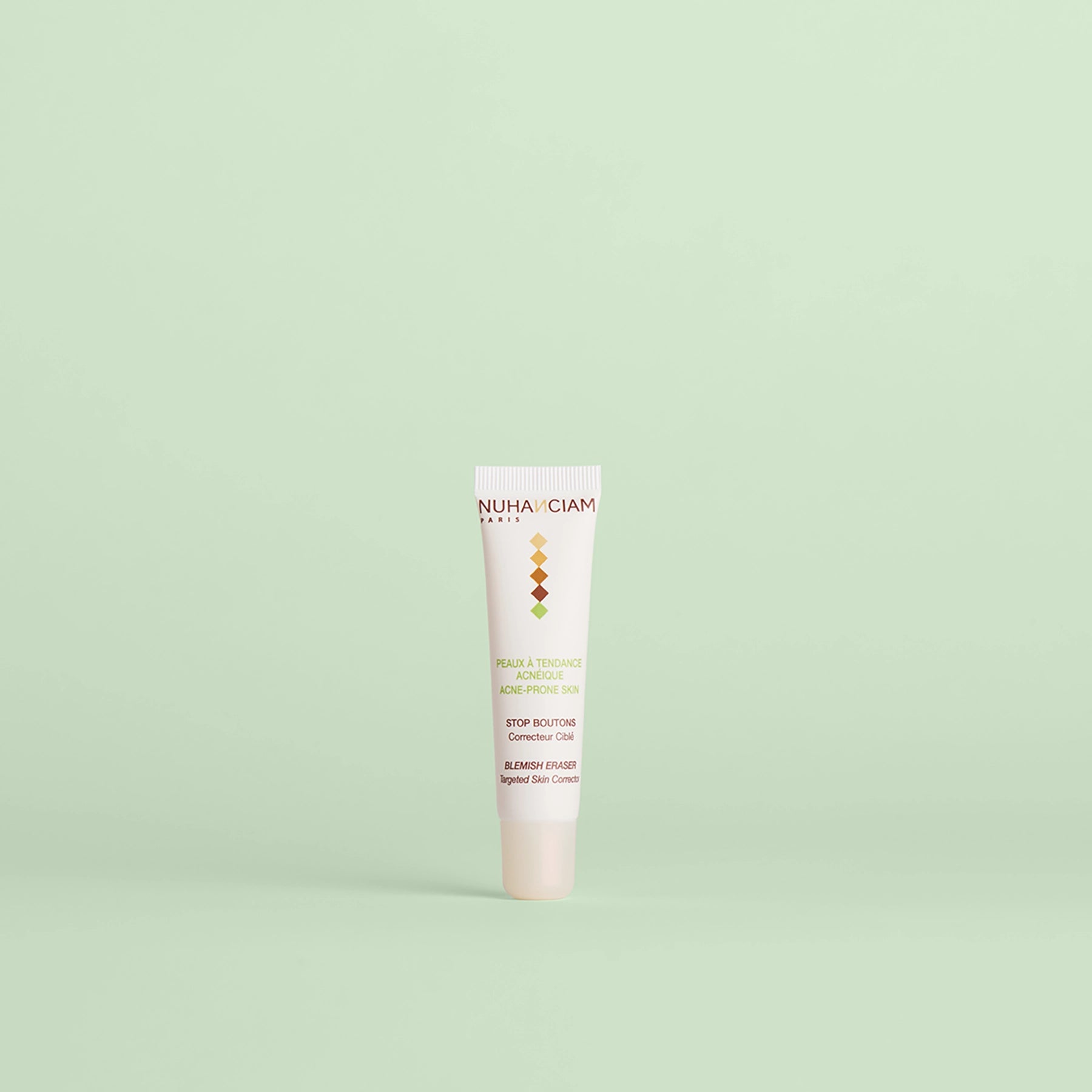 meilleur correcteur boutons acne visage