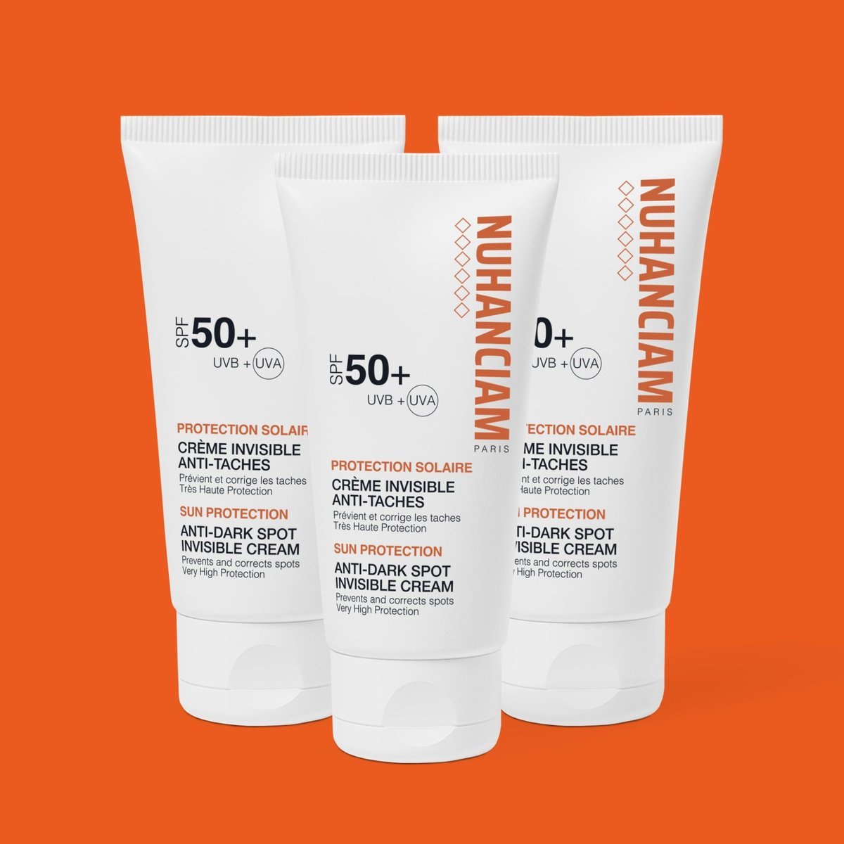 Trois tubes de Crème Solaire Invisible Anti Taches Brunes SPF 50+ de NUHANCIAM